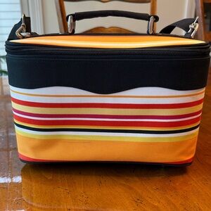 Striped Cosmetic Train Case with adjustable and detachable strap.